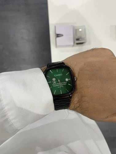ساعة كاسيو بشعار المملكة الالوان ( أسود - أخضر )