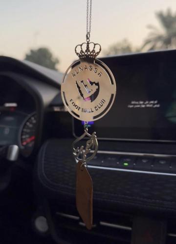 تعليقة سيارة شعار نادي النصر مع تخصيص الاسم حسب ال...