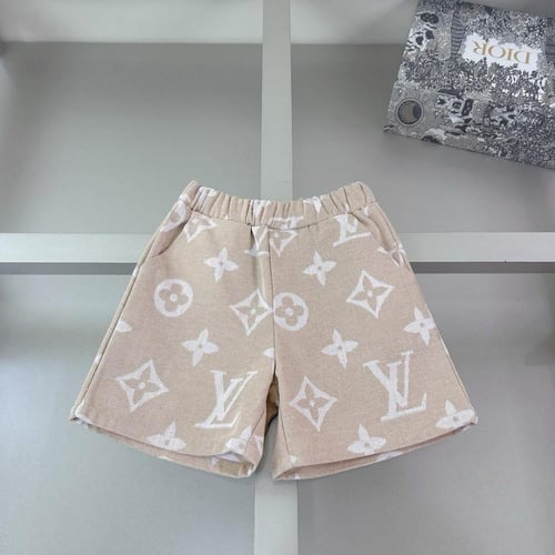 طقم ولادي من قطعتين اللون الأبيض و بيج