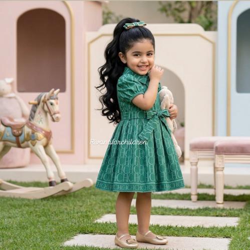 Beautiful green newborn dress with an external belt