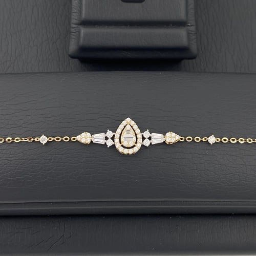 طقم ذهب عيار 18 الوزن 12.23