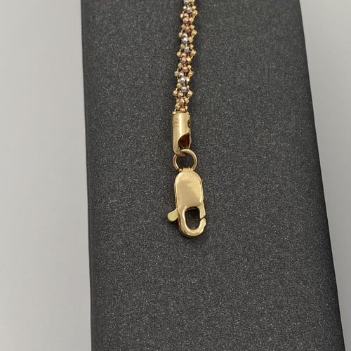 عقد و اسوارة ذهب عيار 18 الوزن 18.76 جرام