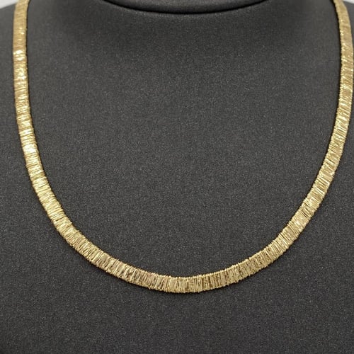 عقد وإسواره ذهب عيار 18 الوزن 15.83 جرام