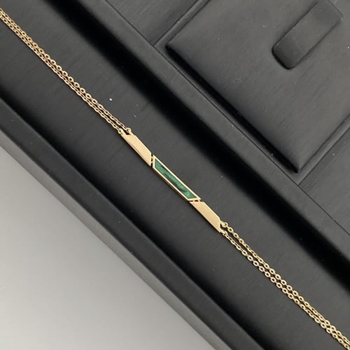 طقم ذهب كامل عيار 18 وزن 12.62 جم بتعليقات سلاسل أ...