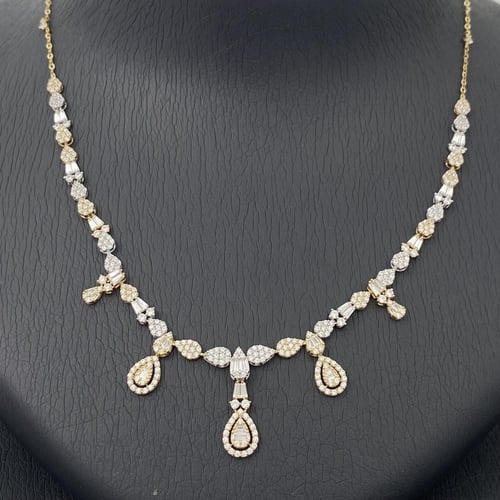 طقم ذهب عيار 18 الوزن 12.23