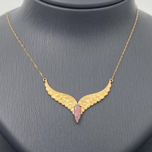 طقم جناح الصقر ذهب عيار 21 وزن 9.44 جم بتصميم ناعم...