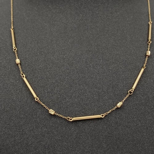 عقد و اسوارة ذهب عيار 18 الوزن 4.13 جرام