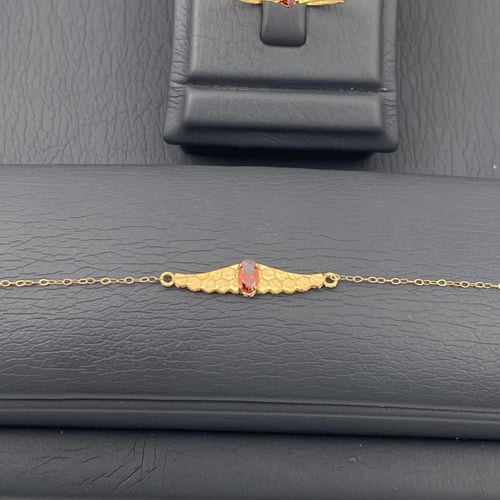 طقم جناح الصقر ذهب عيار 21 وزن 3.54 جم مزين بفص أح...