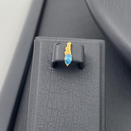 طقم جناح الصقر ذهب عيار 21 وزن 3.13 جم بفص أزرق جذ...