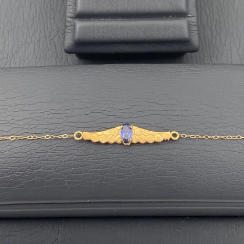 طقم جناح الصقر ذهب عيار 21 وزن 3.56 جرام بفص ازرق...