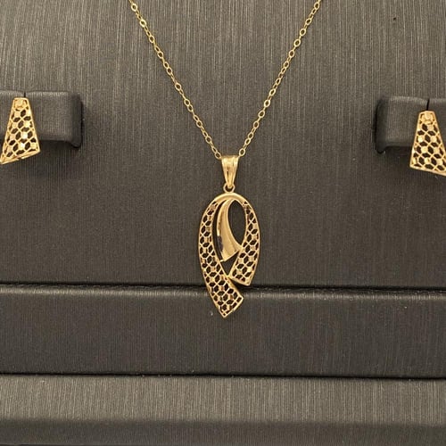 نصف طقم ذهب عيار 21 الوزن 4.09 جرام