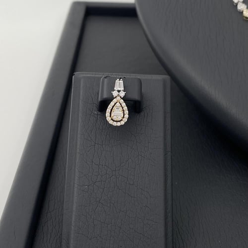 طقم ذهب عيار 18 الوزن 12.23