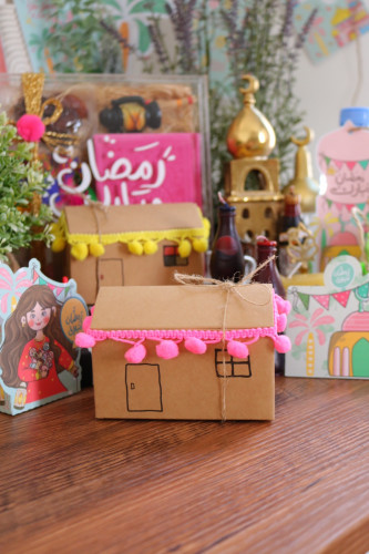 علب كرتونية شكل بيت