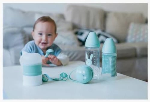 طقم رضاعات و قسام حليب