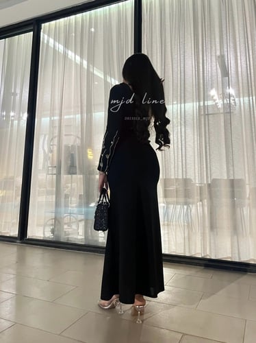 فستان روان مع شك بالاكمام والظهر