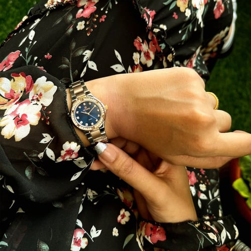 ساعة نسائية ديفوشي استيل بلون فضي و روز قولد