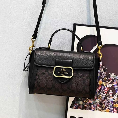 شنطة نسائية جلد كروس بودي ماركة covchie - لون بني...