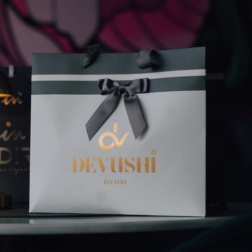 ساعة رجاليه ديفوشي ملفته بلون فضي و ذهبي