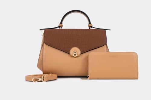 شنطه نسائي جلد بتصميم عصري مميز لون بيج وبني