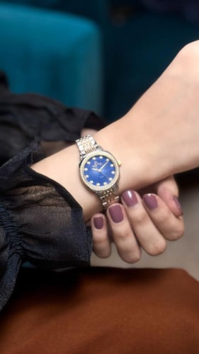 ساعة نسائية انديرا استيل بلون الفضي و الذهبي