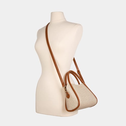 شنطة يد نسائية جلد وقماش بيج وبني– تصميم عصري انيق