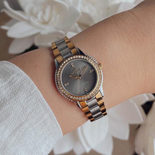 ساعة نسائية بفصوص زركون استيل بلون فضي و ذهبي