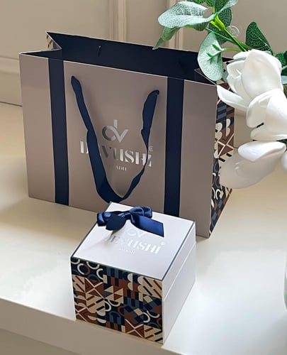 ساعة رجاليه ديفوشي ملفته بلون فضي و ذهبي