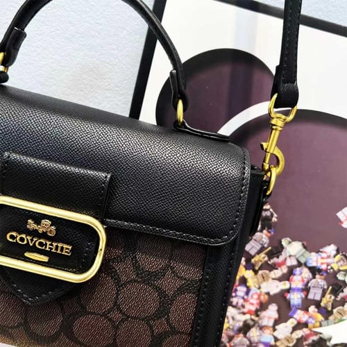 شنطة نسائية جلد كروس بودي ماركة covchie - لون بني...