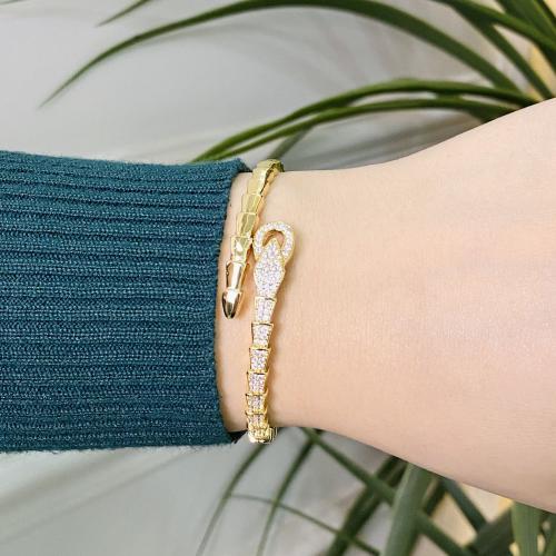 إسوارة نسائية ذهبية بفصوص زركون لامعة – تصميم عصري...