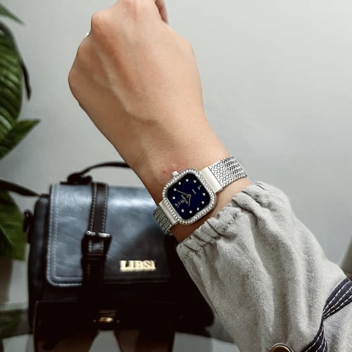 ساعة نسائية ديفوشي شبكي بلون فضي