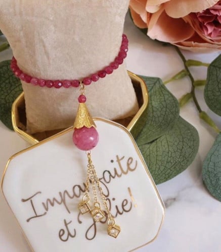 اسوره بحجر روبي مرصع بمكعبات زركون صغيره مطاط