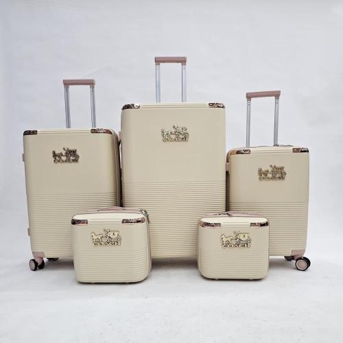 طقم شنط سفر 5 قطع قابل للتوسعة بتصميم COACH – تاوب...