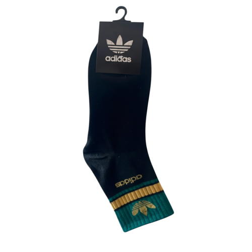 جوارب كاحل بعلامة الوريقات الثلاث من adidas Origin...