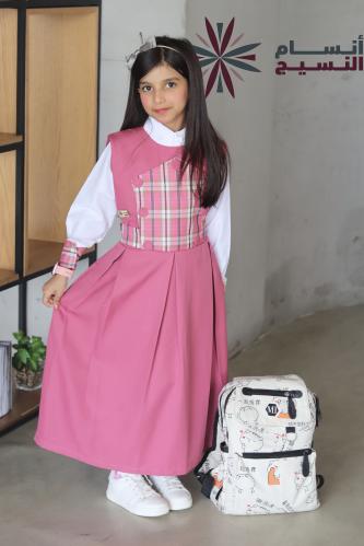 مريول ابتدائي مع قصه في الصدر كاروهات