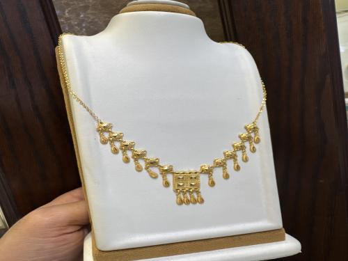 عقد شعبي عيار ٢١