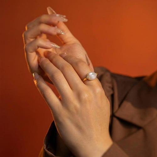 خاتم كوارتز أبيض بيضاوي مطلي بالذهب