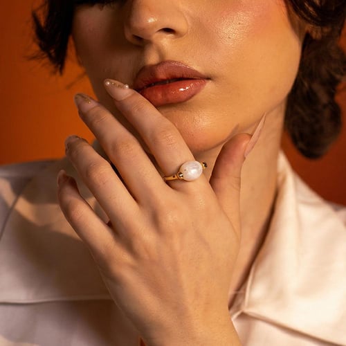 خاتم كوارتز أبيض بيضاوي مطلي بالذهب