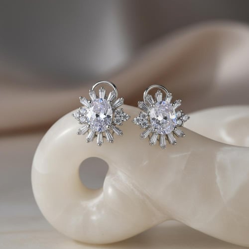 أقراط دبوسية (قفل أوميغا) فضة بأحجار باغيت شفافة