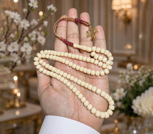 مسباح بكلايت نواعم شبيه العاج 99 خرزه مقاس7.5×6 مل...