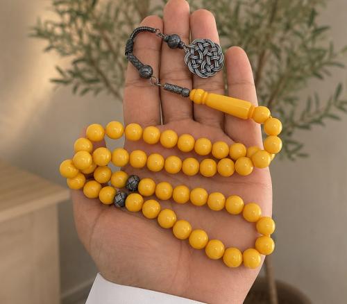 مسباح بكلايت 10 ملي 51 خرزه بفواصل فضه و طربزونه ش...