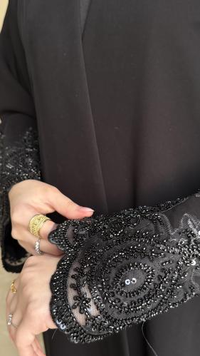 عباية طِرَاز
