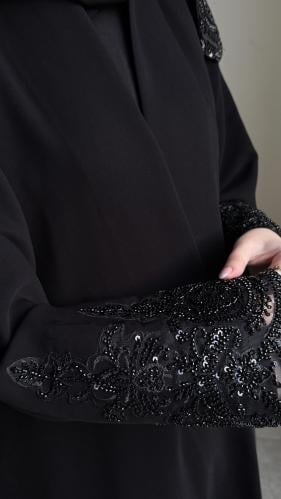 عباية طِرَاز