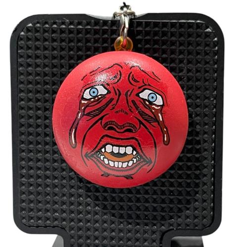 Behelit rubber keychain from berserk exhibition