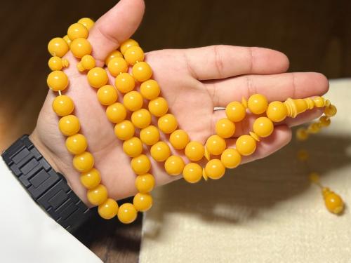 A Zumanah prayer bead with Tamlikah