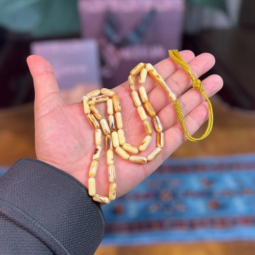 مسباح تراب كهرب صنوبري كركوشة بني