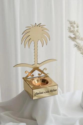 مبخرة المملكة مع سيفين والنخلة بالأسم او عبارة .