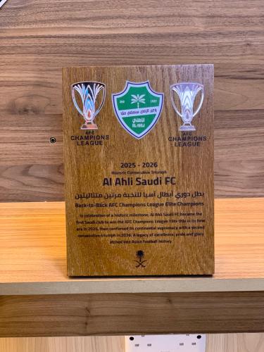 لوح بطل اسيا نادي الاهلي مع كاسين