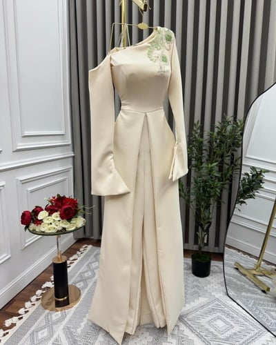 فستان باربي يجمع بين الرقة والفخامة بتطريز يدوي مت...