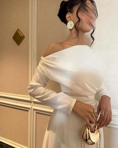 فستان أبيض بتصميم عصري يبرز جمالك