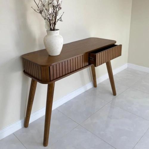 Luxurious wooden entrance table with modern design...